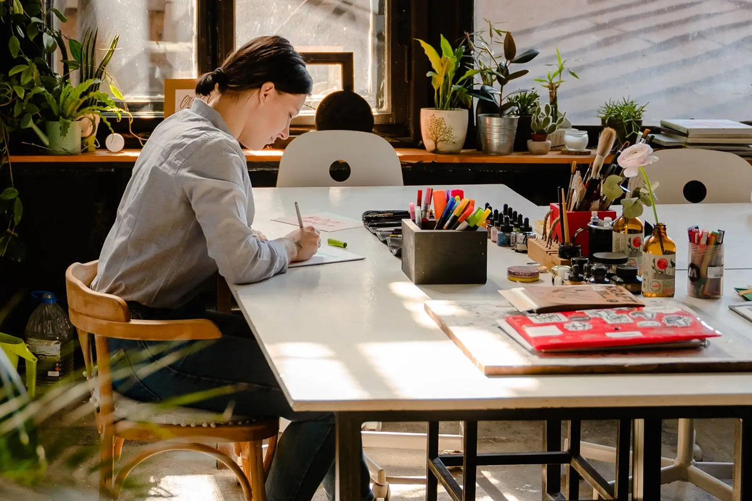 Woman writing at a desk