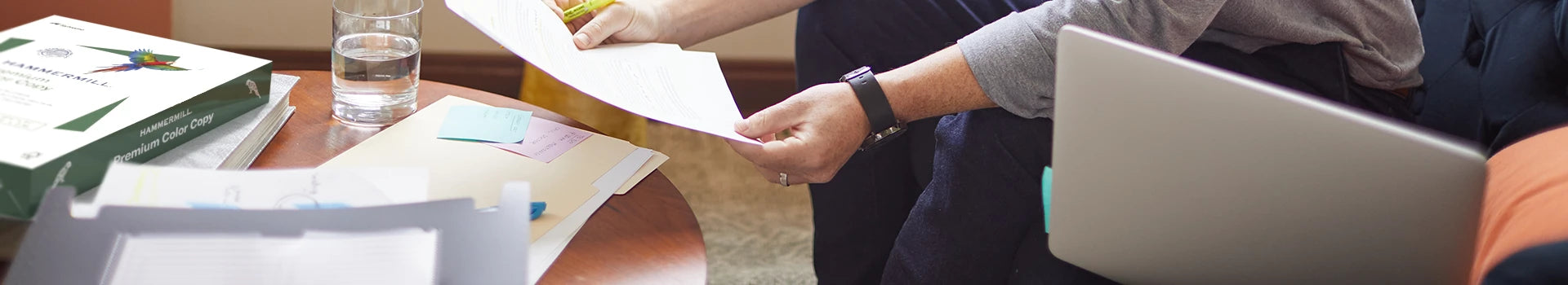 Person looking at a sheet of paper